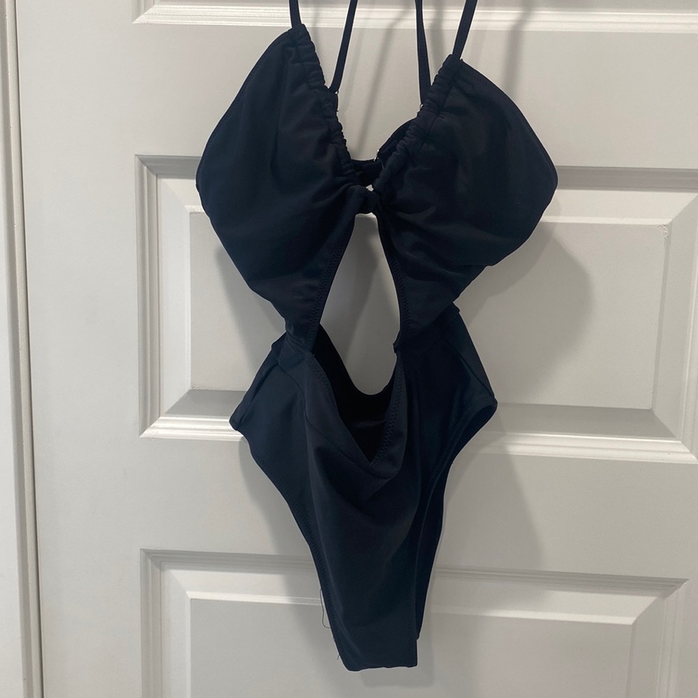 One piece black bathing suit